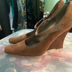 Women Nine West studio wedges.